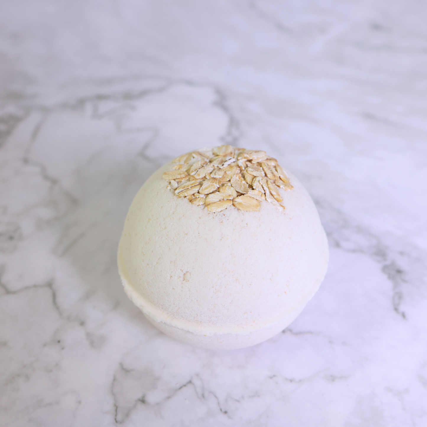 Oat and honey bath bomb